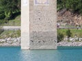 Submerged tower of reschensee church, man swimming next to it Royalty Free Stock Photo