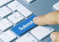 Submit - Inscription on Blue Keyboard Key Royalty Free Stock Photo