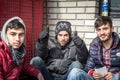 Iraqi refugees, young men, hopeful and smiling, waiting to cross the Serbia-Hungary border at Subotica Serbia bus station Royalty Free Stock Photo