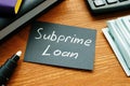 Subprime loan is shown on the conceptual business photo