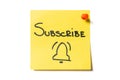 Subscribe and bell drawn on yellow sticky note. Online registration