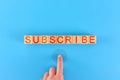 subscribe. man presses the button next to the inscription subscribe. Royalty Free Stock Photo