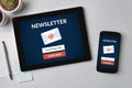 Subscribe newsletter concept on tablet and smartphone screen