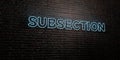 SUBSECTION -Realistic Neon Sign on Brick Wall background - 3D rendered royalty free stock image Royalty Free Stock Photo
