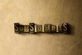 SUBSIDIARIES - close-up of grungy vintage typeset word on metal backdrop Royalty Free Stock Photo