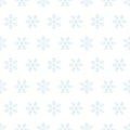 Subtle blue snowflakes on white seamless pattern, vector