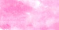Subtle light pink color ink effect shades gradient on textured paper. Smeared aquarelle painted magenta watercolor canvas