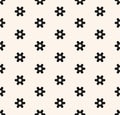 Subtle minimal seamless pattern with small geometric flowers, snowflakes, stars