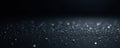 Subtle silver glitter scattered on black backdrop, black background, subtle glitter, celebratory background Royalty Free Stock Photo