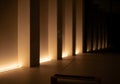 Subtle warm lighting illuminates a minimalist interior, creating a serene atmosphere. Vertical Royalty Free Stock Photo
