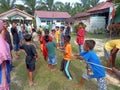 Subulussalam, Indonesia - August 18, 2022: Groups of kids playing tug of war game during celebrate Independence day of Indonesia Royalty Free Stock Photo