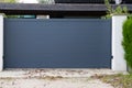 Suburb home large grey dark metal aluminum house gate slats garden access door