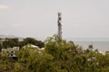 Suburban Communications Tower Behind Trees Royalty Free Stock Photo