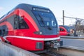 Suburban electric trains at the platform waiting for passengers