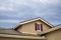 Suburban house attic window Royalty Free Stock Photo