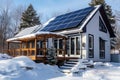 Suburban house with a photovoltaic system on the roof. Modern eco friendly passive house with solar panels on the gable