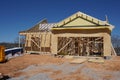 Construction of a suburban home showing the framing