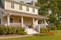 Suburban house with white porch Royalty Free Stock Photo