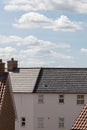 Suburban housing. Modern white house building with slate roof ti Royalty Free Stock Photo