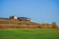 Suburban luxury real estate, modern cottage on a green hill