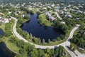 Suburban Neighborhood Aerial with Pond Royalty Free Stock Photo