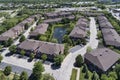 Suburban Townhouse Neighborhood Aerial with Pond Royalty Free Stock Photo