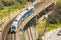 Suburban train crossing a viaduct over AlcÃÂ¢ntara Valley in Lisbon, Portugal