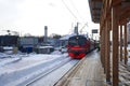 Suburban train ED4M at the temporary wooden platform in Balashikha railway station, Russia. Royalty Free Stock Photo