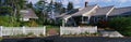 Suburban-type house with white picket fence Royalty Free Stock Photo