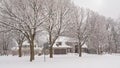 Suburbian house in the snow along a park in Montreal Royalty Free Stock Photo