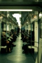 Subway car shot inside with passengers