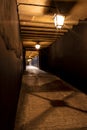 Subway corridor of a Spanish winery. Wine bottles stacked at the end