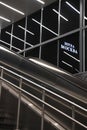 Subway escalator with lights and hotel Moscow sign in the night Royalty Free Stock Photo