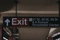 Subway exit sign to 47s,48s,49s street and Rockefeller Center frrom subway platform in New York, USA.