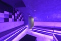 Subway nightclub room with white upholstered armchairs along the wall and led lights on the skirting boards