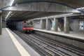 subway passenger carriages arriving at the square of spain station atrium