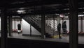 Subway passengers waiting in the cold for train