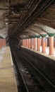Subway rail line underground platform single track very old station Royalty Free Stock Photo