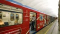 The subway in St. Petersburg is decorated in honor of the confederations Cup and upcoming World Cup and passengers Royalty Free Stock Photo