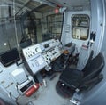 Subway train drivers cabin: seat, dashboard, speed control handle Royalty Free Stock Photo