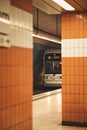 Subway train enters Musikforum station at Bermudadreieck in Bochum, Germany.