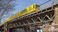 A Subway Train on the iron bridge under the working district it Berlin Royalty Free Stock Photo