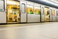 Subway train and passengers at Karlsplatz station, Vienna, Austria. Royalty Free Stock Photo