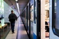 Subway train staying on a metro station with doors open with defocused background s Royalty Free Stock Photo