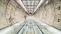Subway tunnel walkway with no people. Public transportation, construction industry, civil engineering, city life, or futuristic in Royalty Free Stock Photo