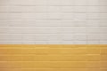 Subway wall background with white and yellow tiles texture