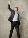 Succesful young manager presenting the victory gesture Royalty Free Stock Photo