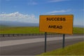 `Success Ahead` Yellow Road Sign
