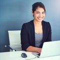 Success is all in a days work. a young businesswoman working at her desk. Royalty Free Stock Photo