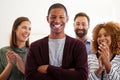 Success, applause and portrait of black man in office for celebration, teamwork and achievement. Support, happy and Royalty Free Stock Photo